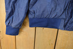 Vintage 1990s Nike Mini Swoosh Hooded Windbreaker Jacket Men's Large