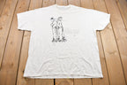 Vintage 1990s Jerzees Cartoon Bible Verse Graphic T Shirt