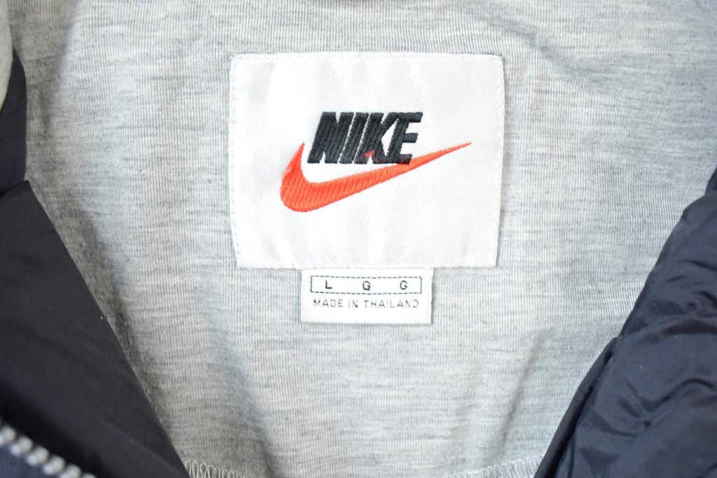 Vintage 1990s Nike Hidden Pocket Windbreaker Jacket