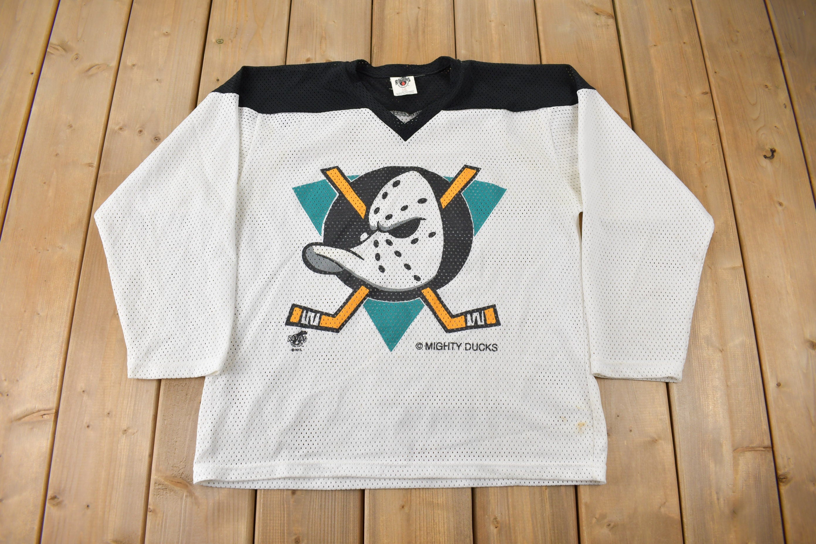 Vintage 1990s Anaheim Mighty Ducks NHL Ravens Hockey Jersey Made In Canada Size Youth Large