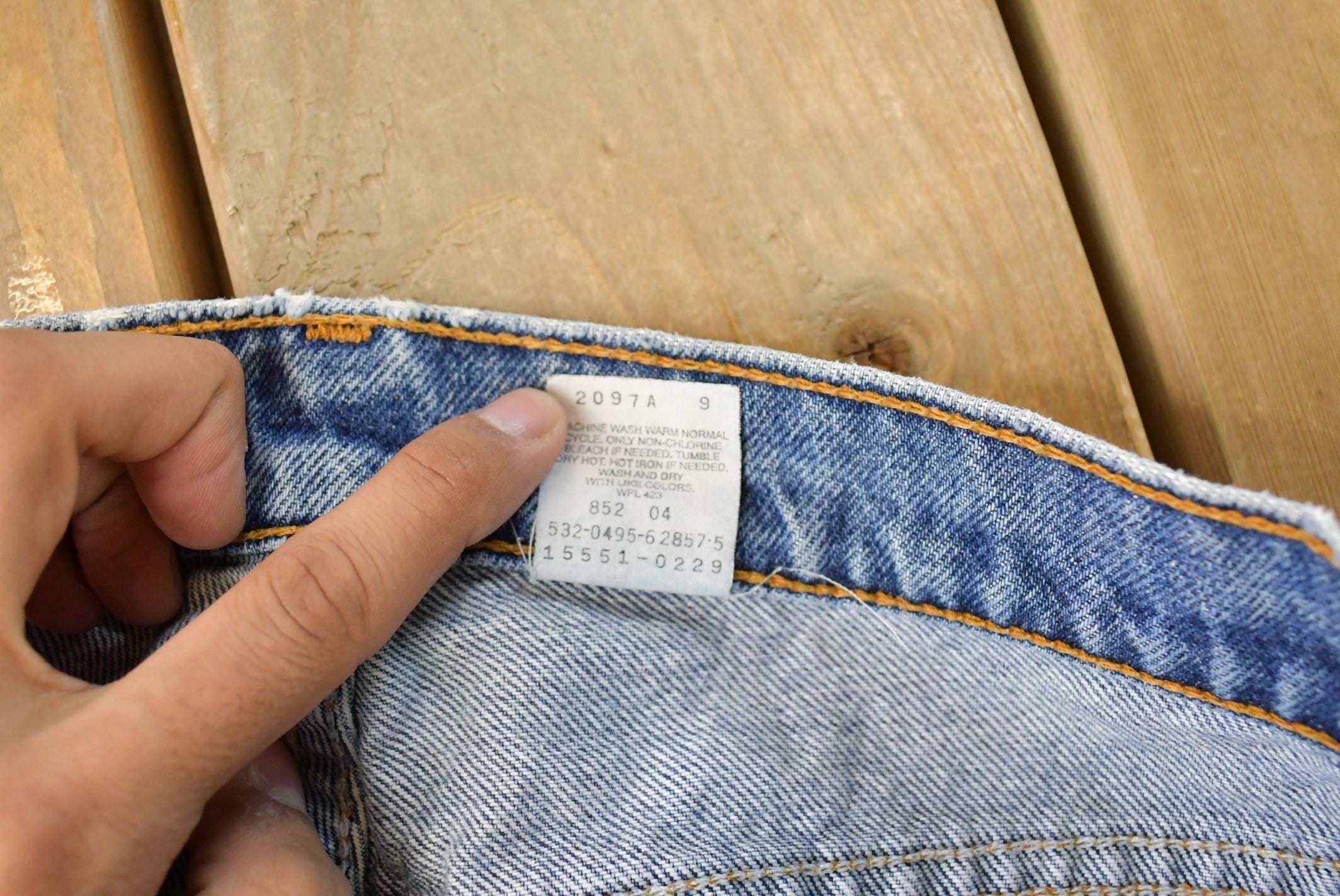 Vintage 1990s Levi's 551 Relaxed Tapered Fit Denim Jeans Women's 33 x 30 / Distressed Jeans / Made in USA
