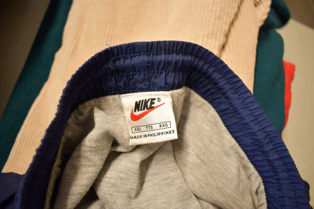 Vintage 1990s Nike Mini Swoosh Track Pants Size XL