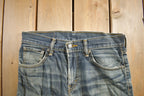 Vintage 1990s Levi's 521 Distressed Jeans Size 29x32