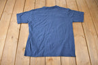 Vintage 1990s MECCA Women's Graphic T Shirt SIze XL 14-16