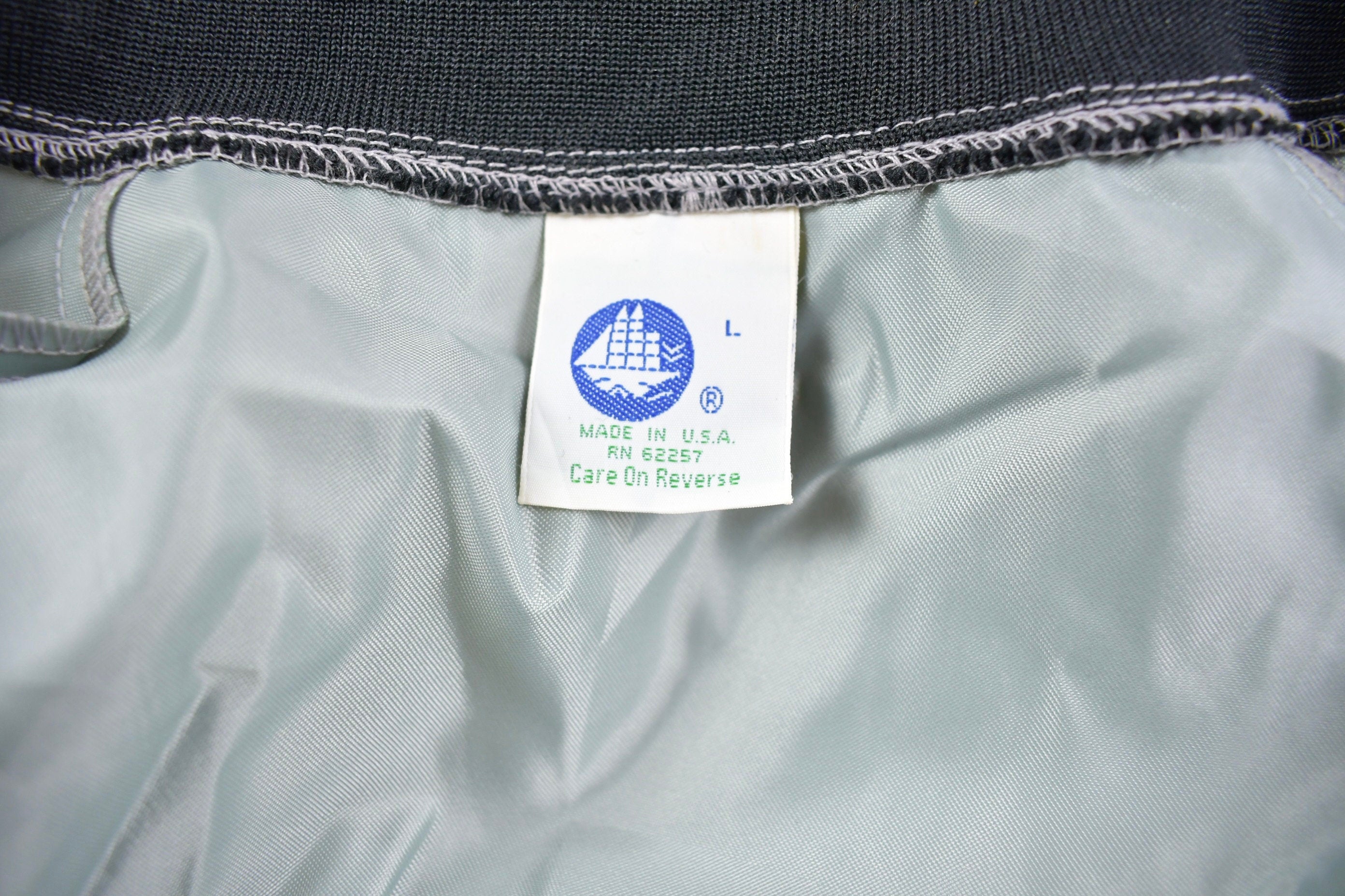 Vintage 1980s John D. Roba And Associates The Spirt Of Success Satin Bomber Snap Button Silver Jacket