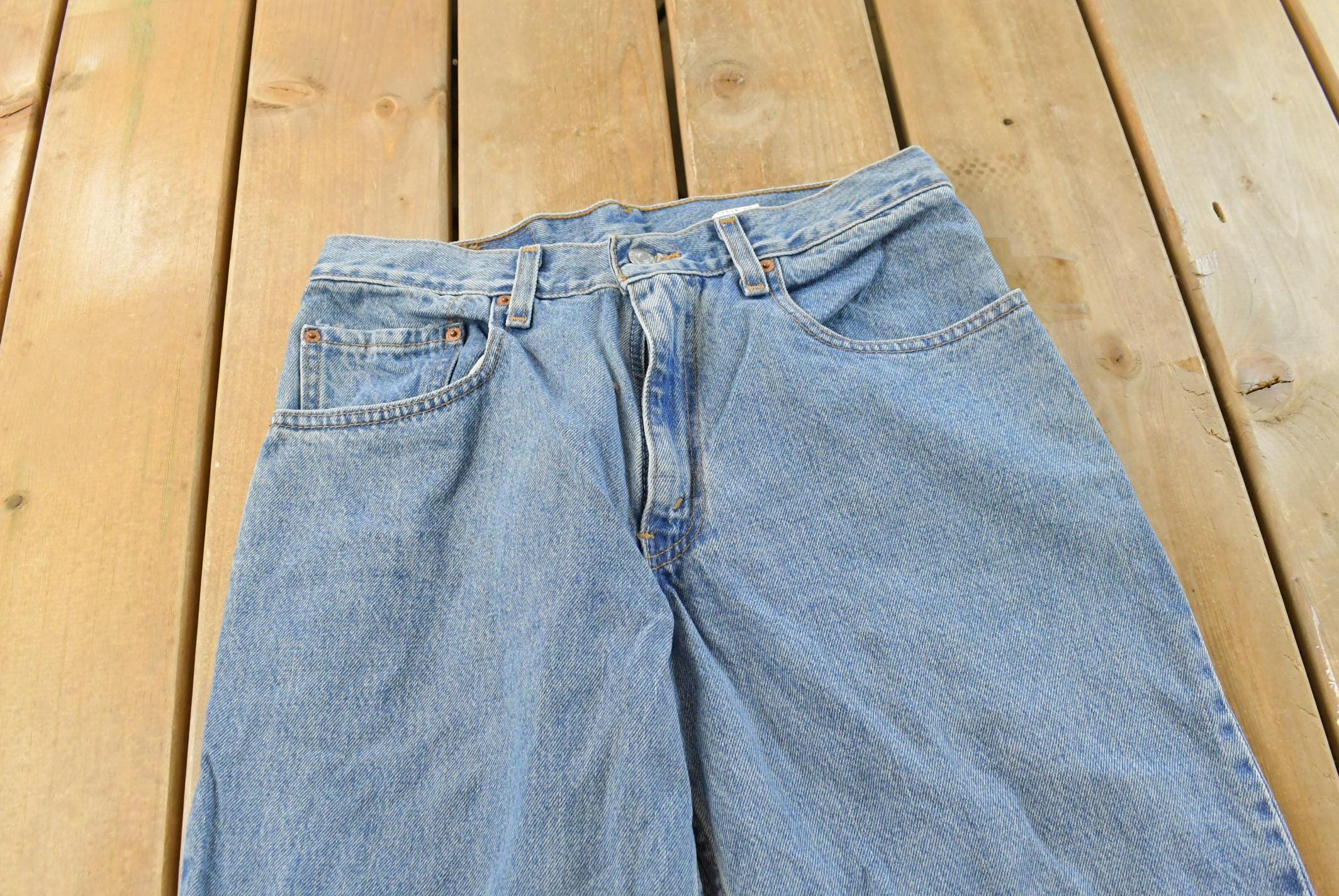 Vintage 1990s Levi's 560 Loose Fit Denim Blue Jeans Size 30 x 32 / 90s Levi's / Distressed Sun Faded Jeans / Made in USA / Streetwear