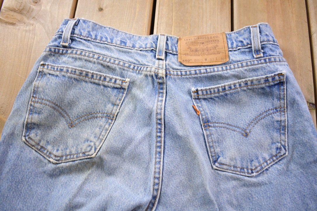 Vintage 1990s Levi's 550 Orange Tab Denim Jeans Size 30 x 30