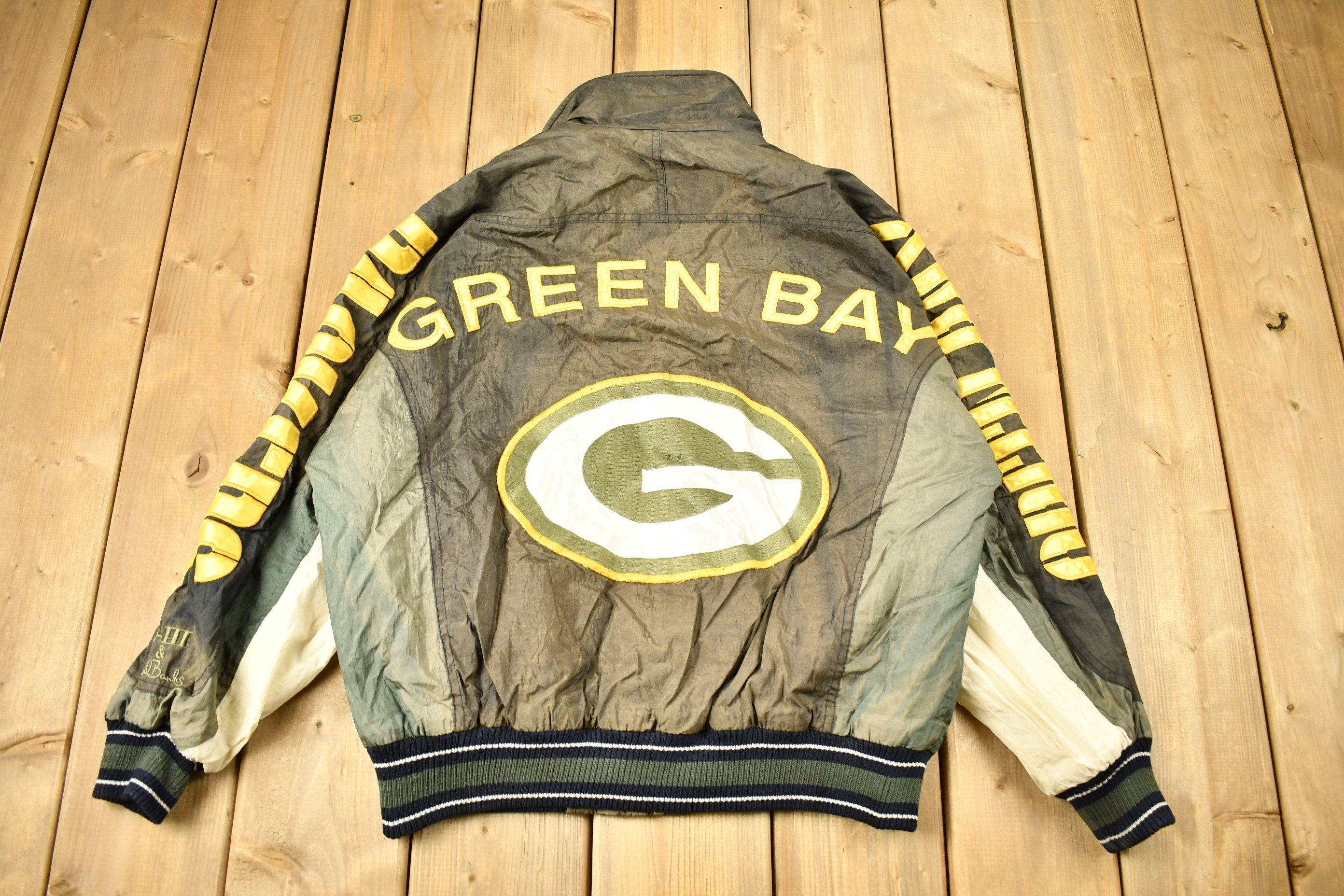 Vintage 1990s Green Bay Packers NFL Ladies First Puffer Jacket