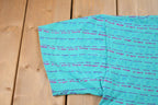 Vintage 1991 Ocean Pacific All Over Print Graphic T Shirt