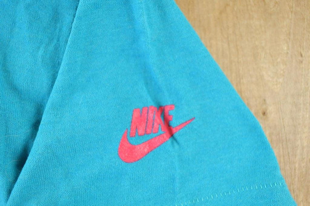 Vintage 1989 Nike Get In Gear Graphic T-Shirt