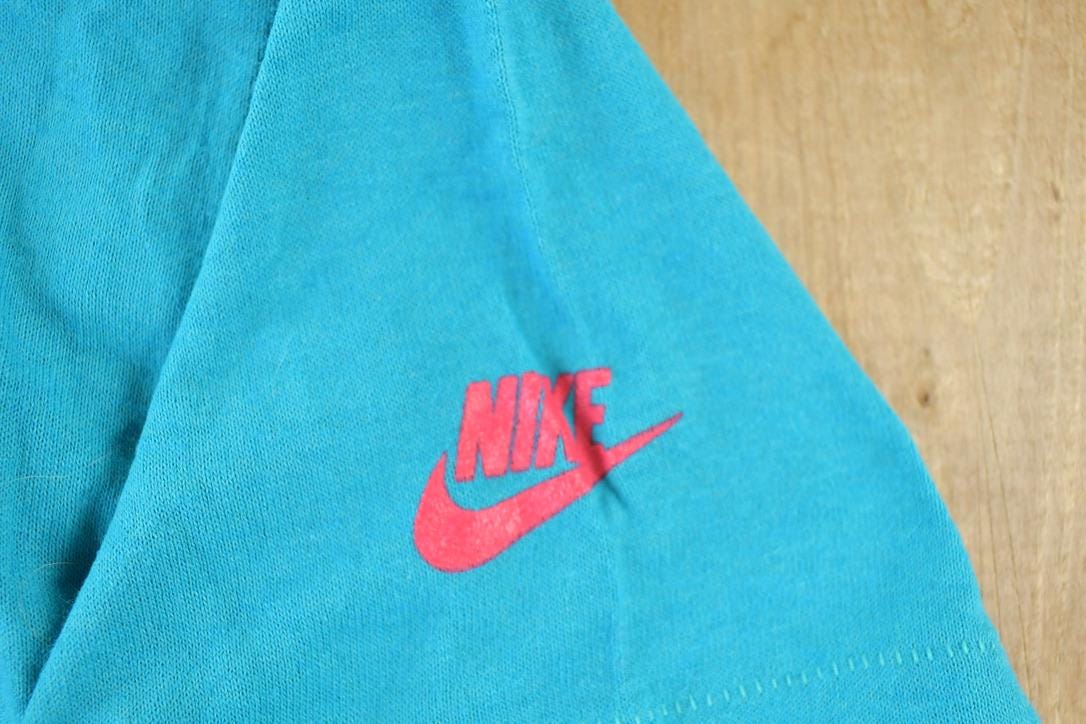 Vintage 1989 Nike Get In Gear Graphic T-Shirt