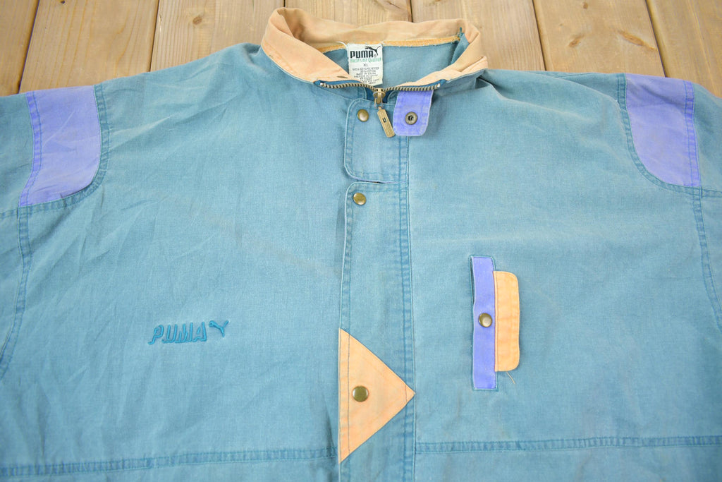 Vintage 1990s Puma Embroidered Sun Faded Windbreaker Jacket Size XL