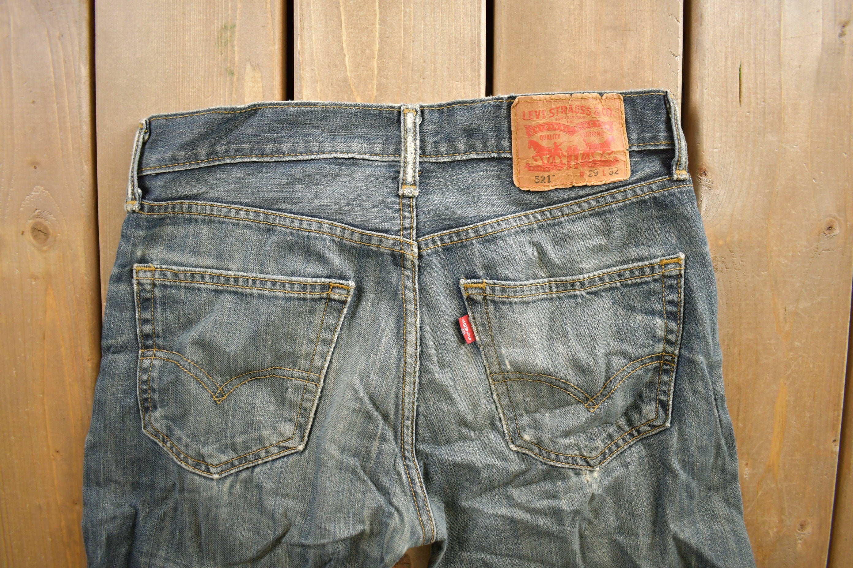Vintage 1990s Levi's 521 Distressed Jeans Size 29x32