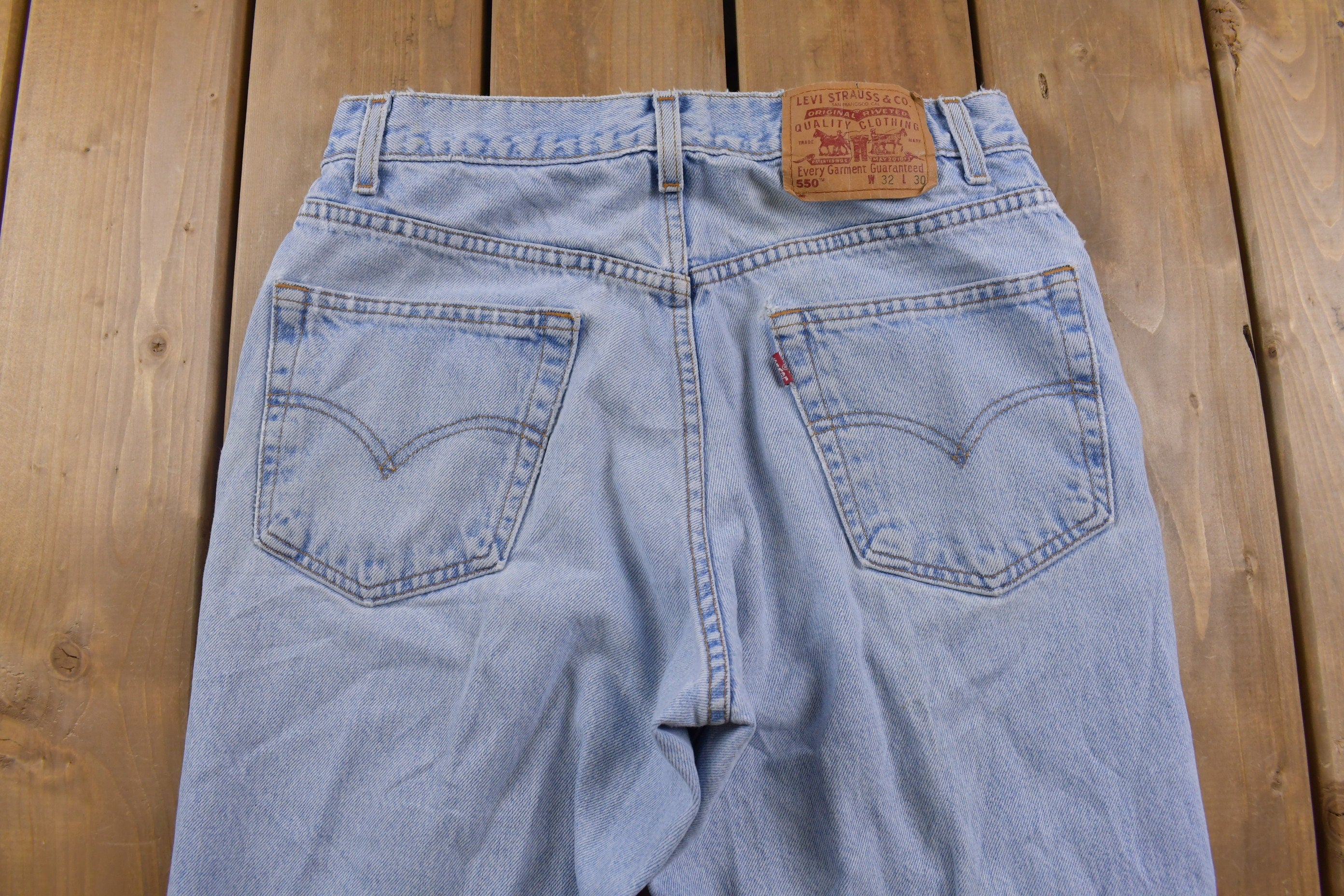 Vintage 1990s Levi's 550 Red Tab Jeans Size 30 x 29