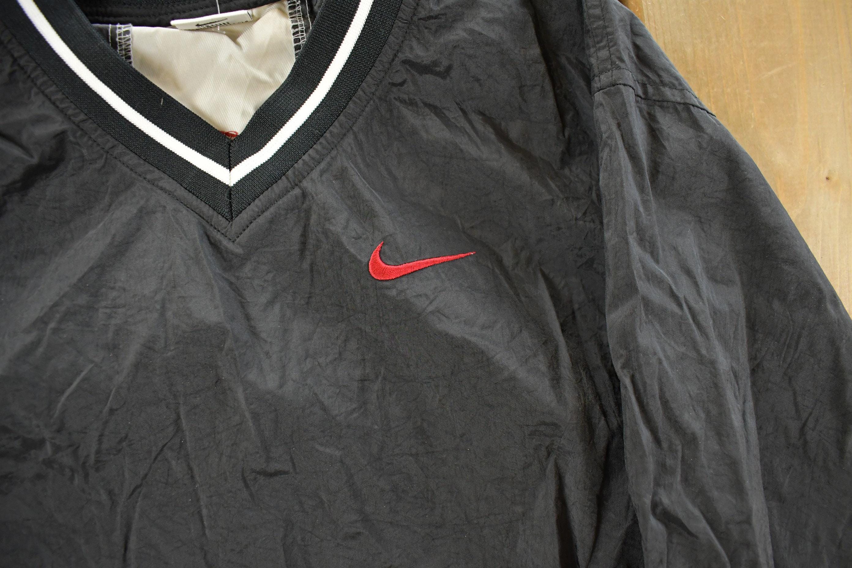 Vintage 1990s Nike Embroidered Mini Swoosh Pullover Windbreaker Youth Small