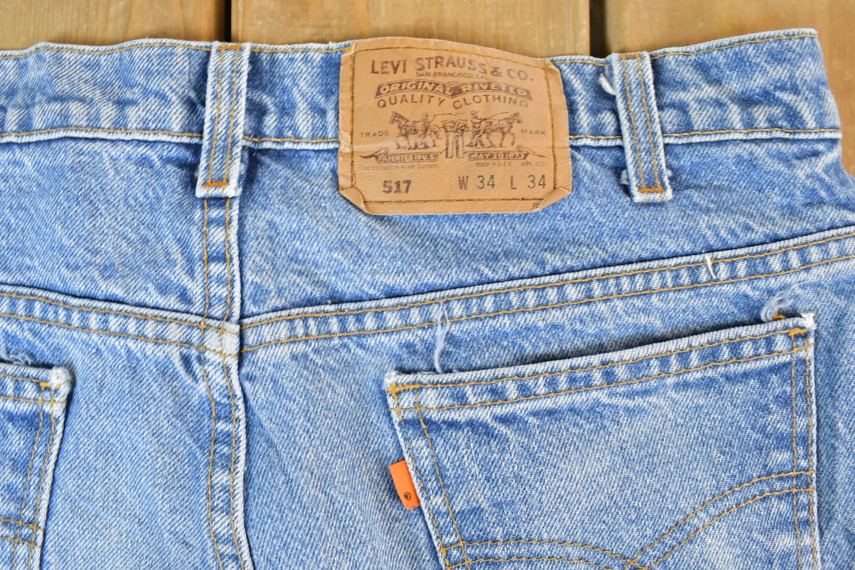 Vintage 1990s Levi Strauss 517 Orange Tab Denim Jeans Size 34x34