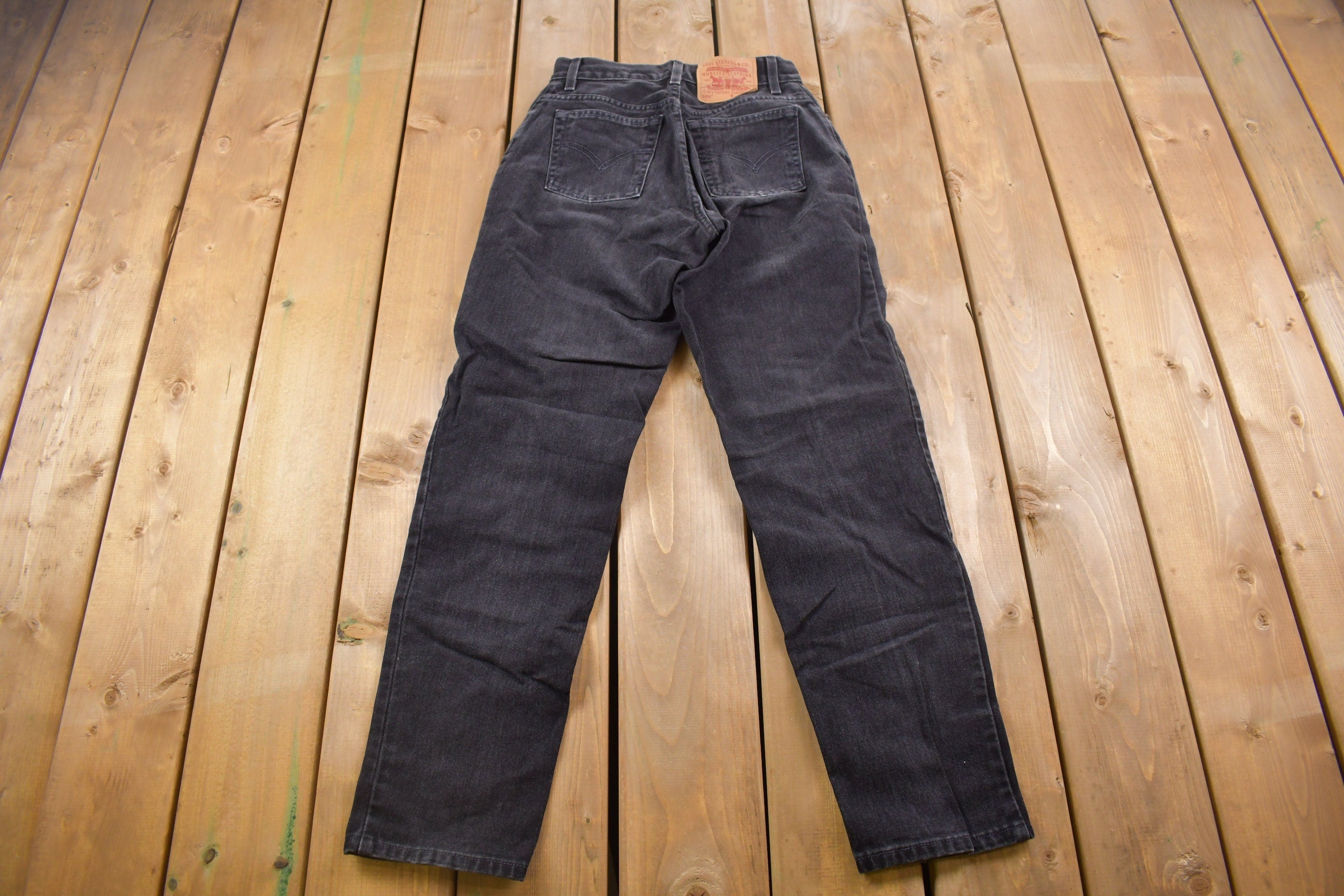 Vintage 1990s Levi's 550 Red Tab Black Jeans Size 26 x 30