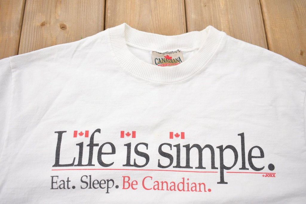 Vintage 1990s Life is Simple Eat Sleep Be Canadian Souvenir T Shirt