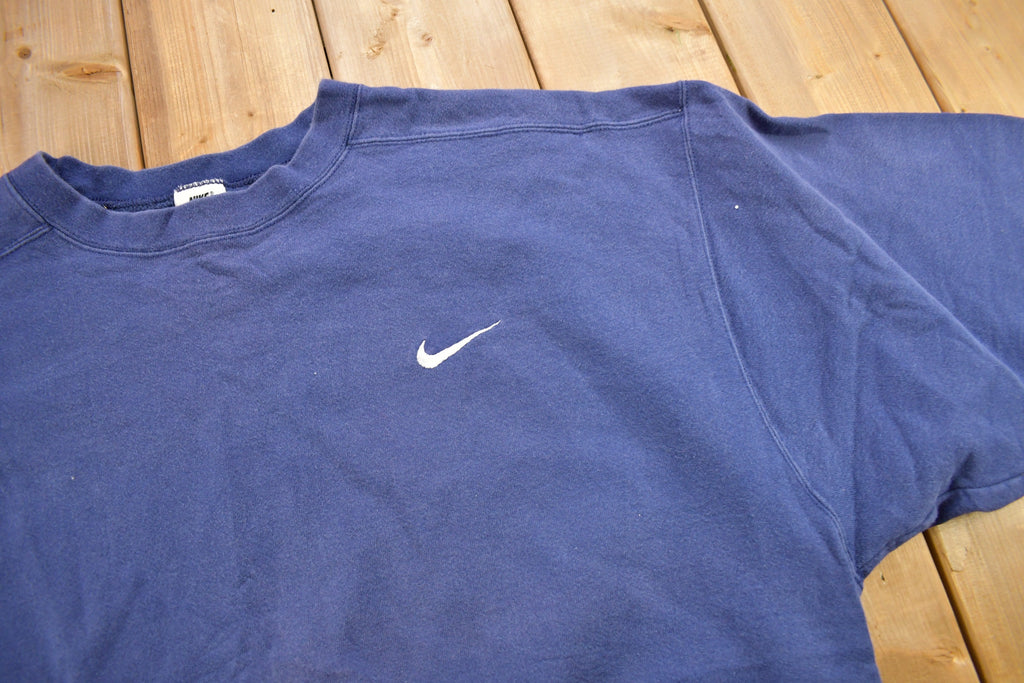 Vintage 1990s Nike Embroidered Mini Swoosh Blue Crewneck Sweatshirt