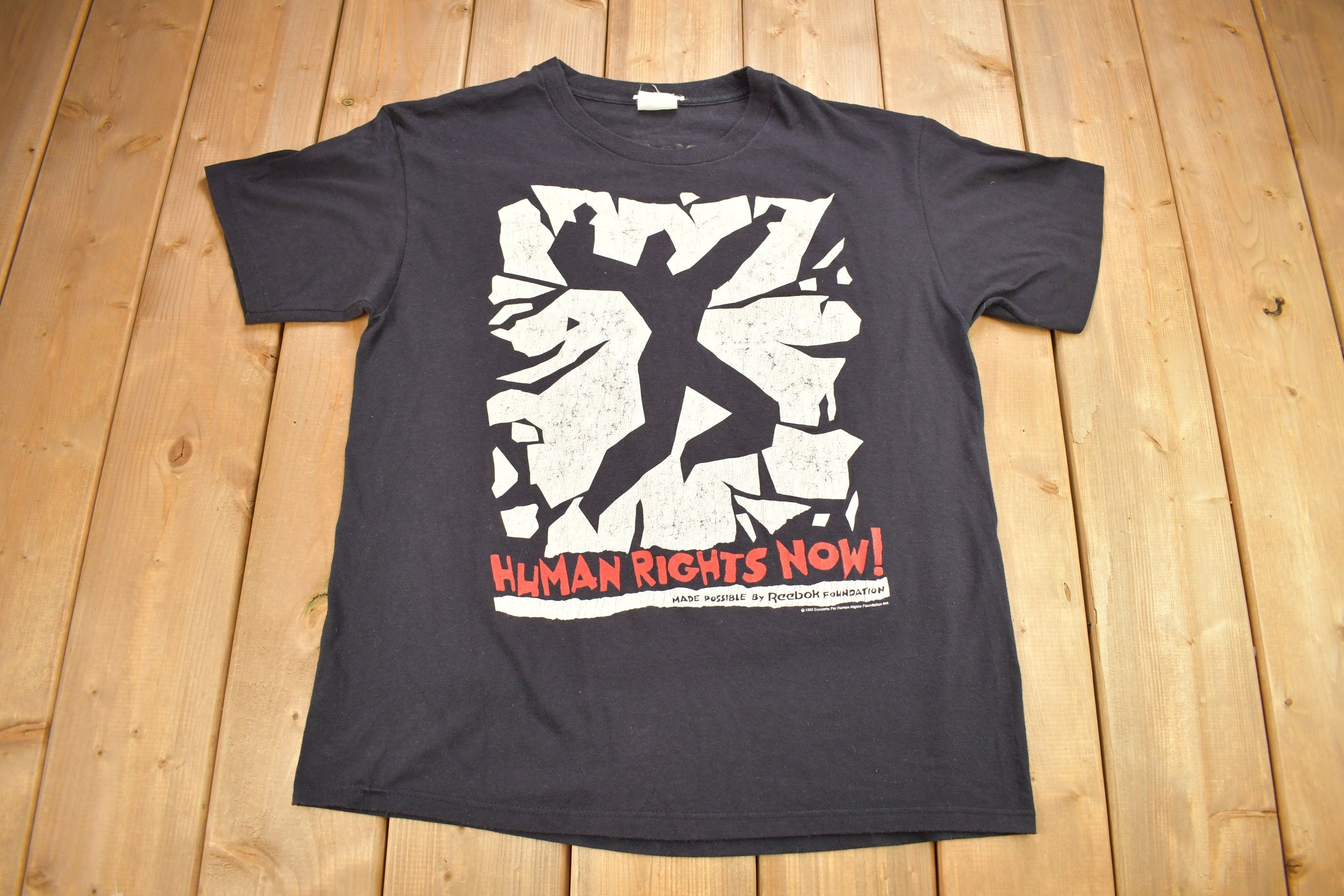 Vintage 1980s Reebok Concerts For Human Rights Graphic T-Shirt Single Stitch