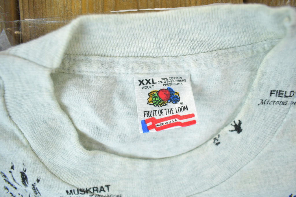 Vintage 1990s Animal Tracks All Over Print Graphic T-Shirt