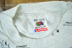 Vintage 1990s Animal Tracks All Over Print Graphic T-Shirt