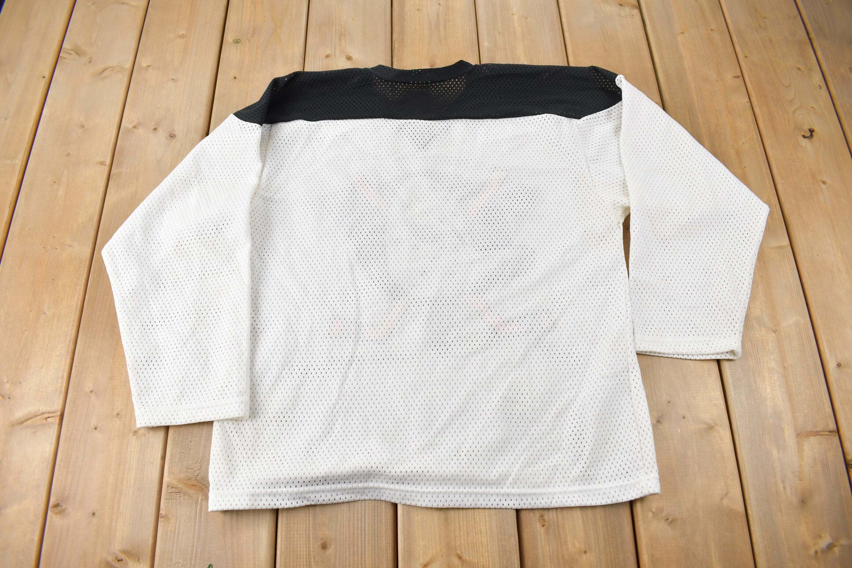 Vintage 1990s Anaheim Mighty Ducks NHL Ravens Hockey Jersey Made In Canada Size Youth Large