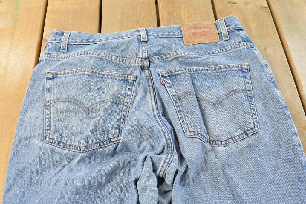 Vintage 1990s Levi's 560 Loose Fit Denim Blue Jeans Size 35 x 30 / 90s Levi's / Distressed Sun Faded Jeans / Streetwear