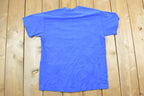 Vintage 1990s Aged To Perfection Peacock Papers Boston Graphic T-Shirt