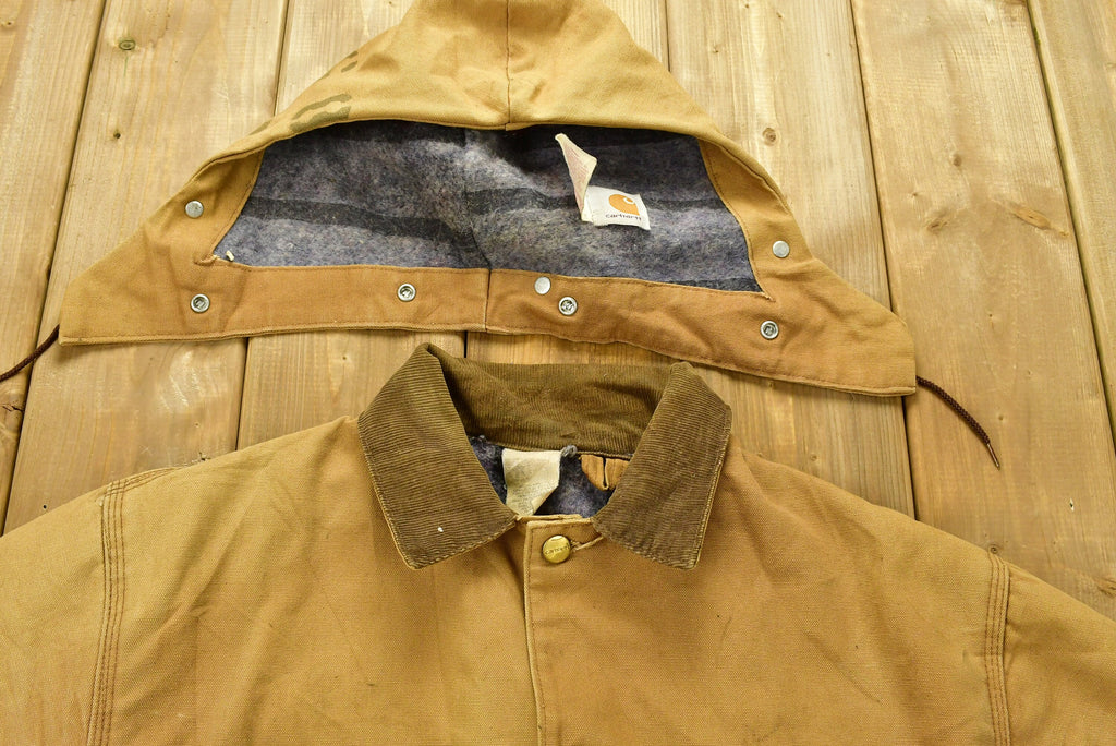 Vintage Carhartt Chore Coat Blanket Lined 1980s With Hood / Vintage Workwear / Streetwear / Made In USA / 90s / Distressed Carhartt