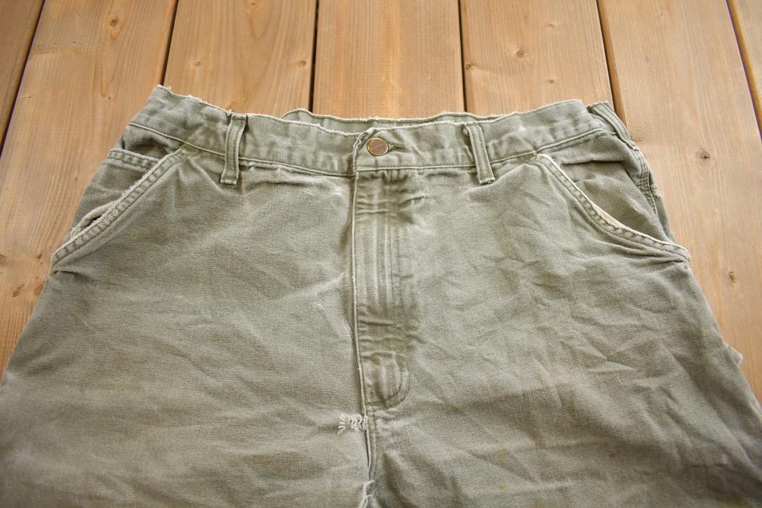 Vintage 1990s Carhartt Distressed Dungaree Fit Work Pants Size 36x32