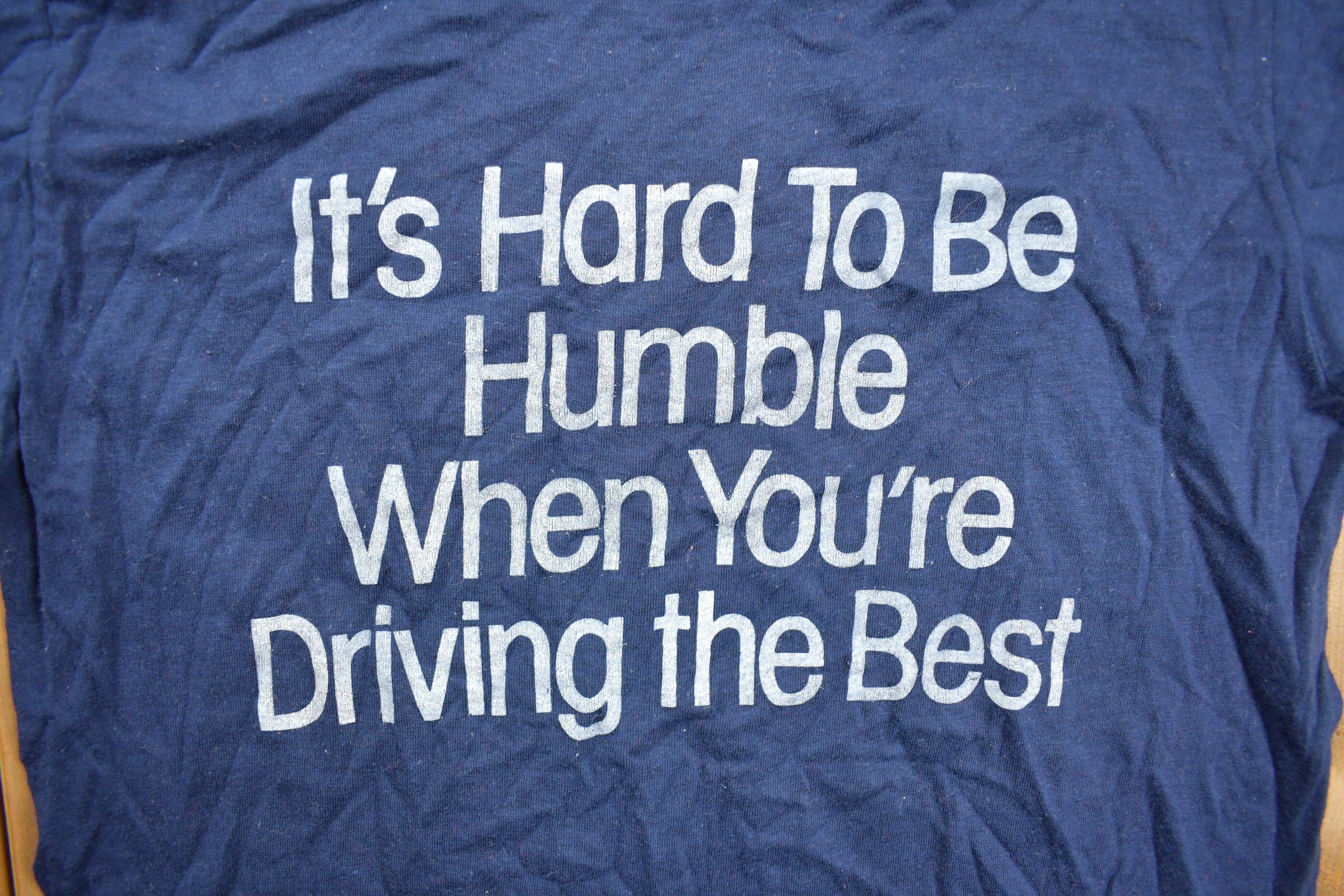 Vintage 1980s "Its Hard To Be Humble When You're Driving The Best" Graphic T Shirt