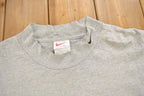 Vintage 1990s Nike Embroidered Mini Swoosh Mockneck Sweatshirt