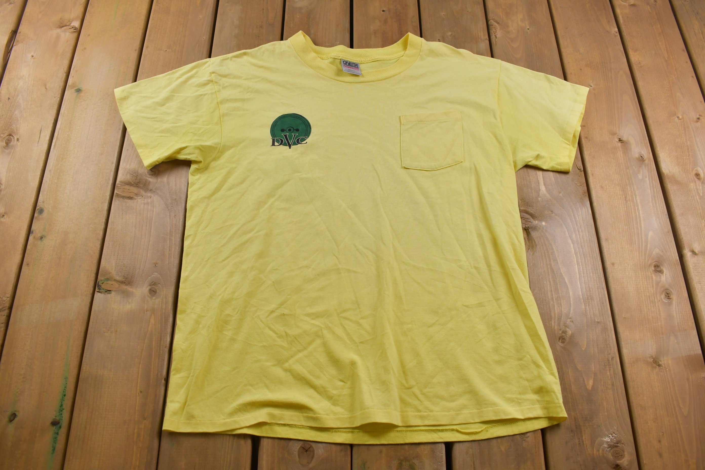 Vintage 1990s DVC Pocket Graphic T-Shirt  Streetwear  Retro Style  Single Stitch  Made In USA  90s Graphic Tee