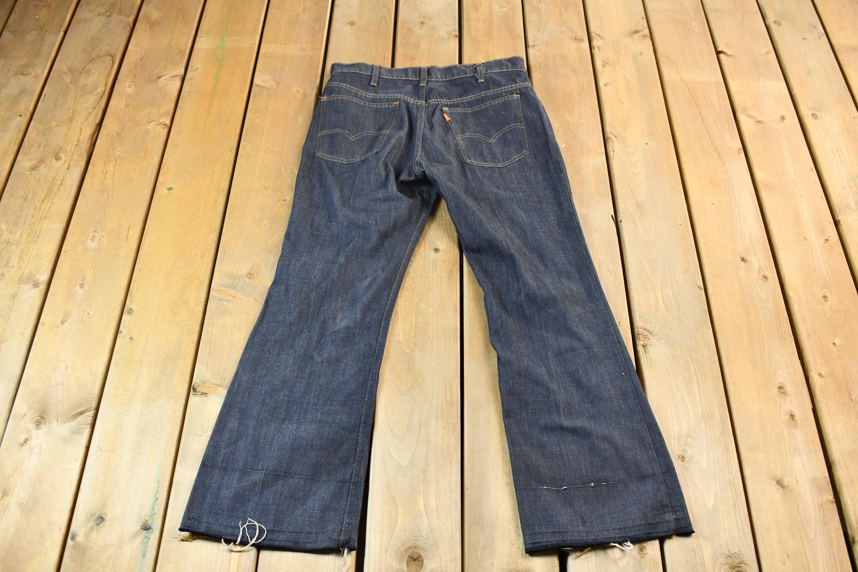 Vintage 1990s Dark Wash Levi's Bell Bottom Orange Tab Flare Jeans Size 32 x 28