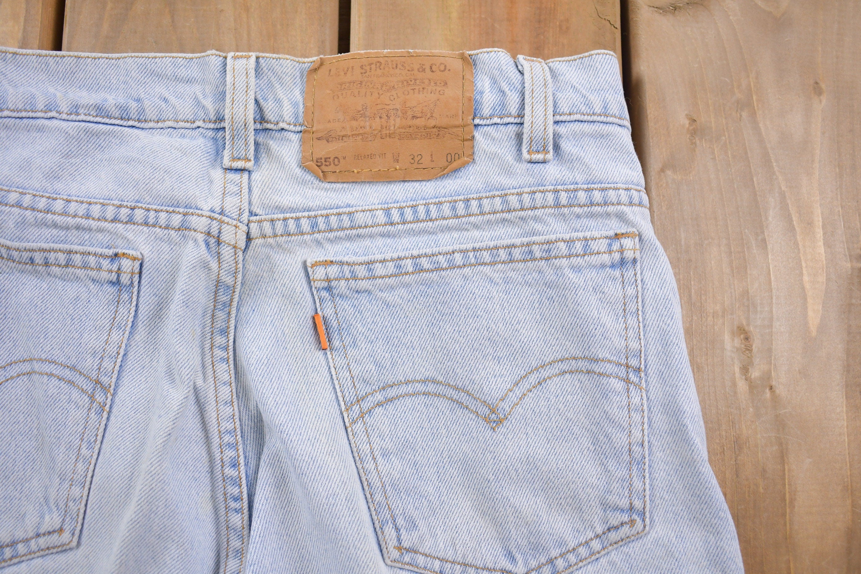Vintage 1990s Levi's 550 Orange Tab Jean Shorts 30 x 8