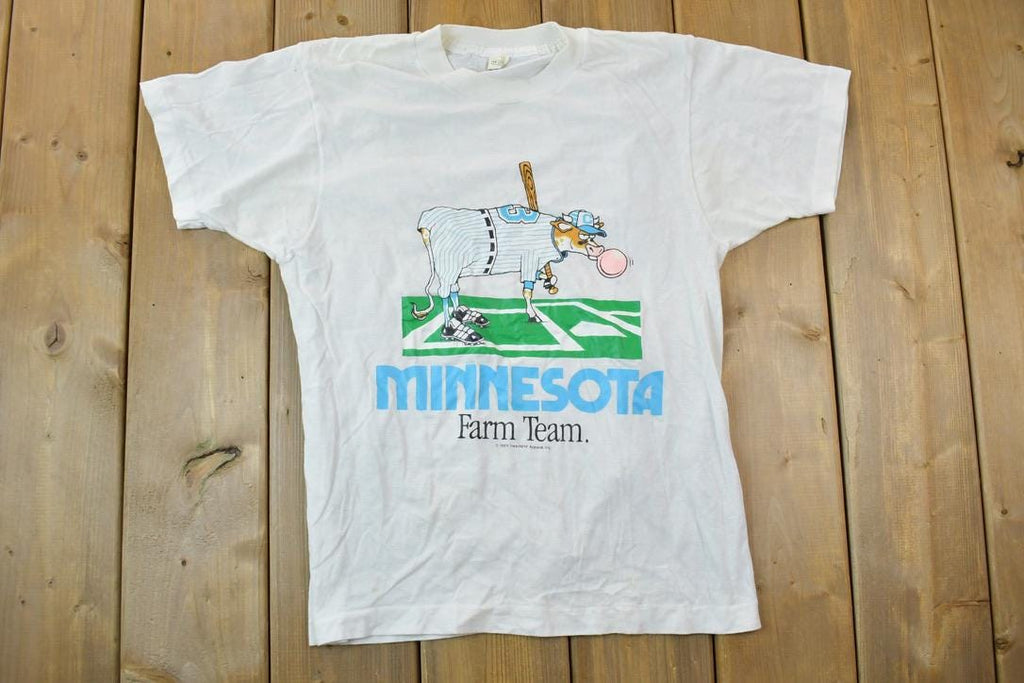 Vintage 1989 Heartland Apparel Minnesota Farm Team Graphic T-Shirt