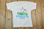 Vintage 1989 Heartland Apparel Minnesota Farm Team Graphic T-Shirt