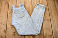 Vintage 1990s Perfectly Distressed Levi's 550 Light Wash Jeans
