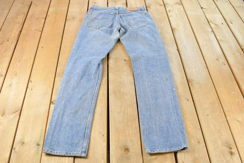 Vintage 1990s Levi's 505 Regular Fit Denim Jeans Men's 32 x 33.5 / Regular Fit / 90s Levi's / Distressed Sun Faded Jeans