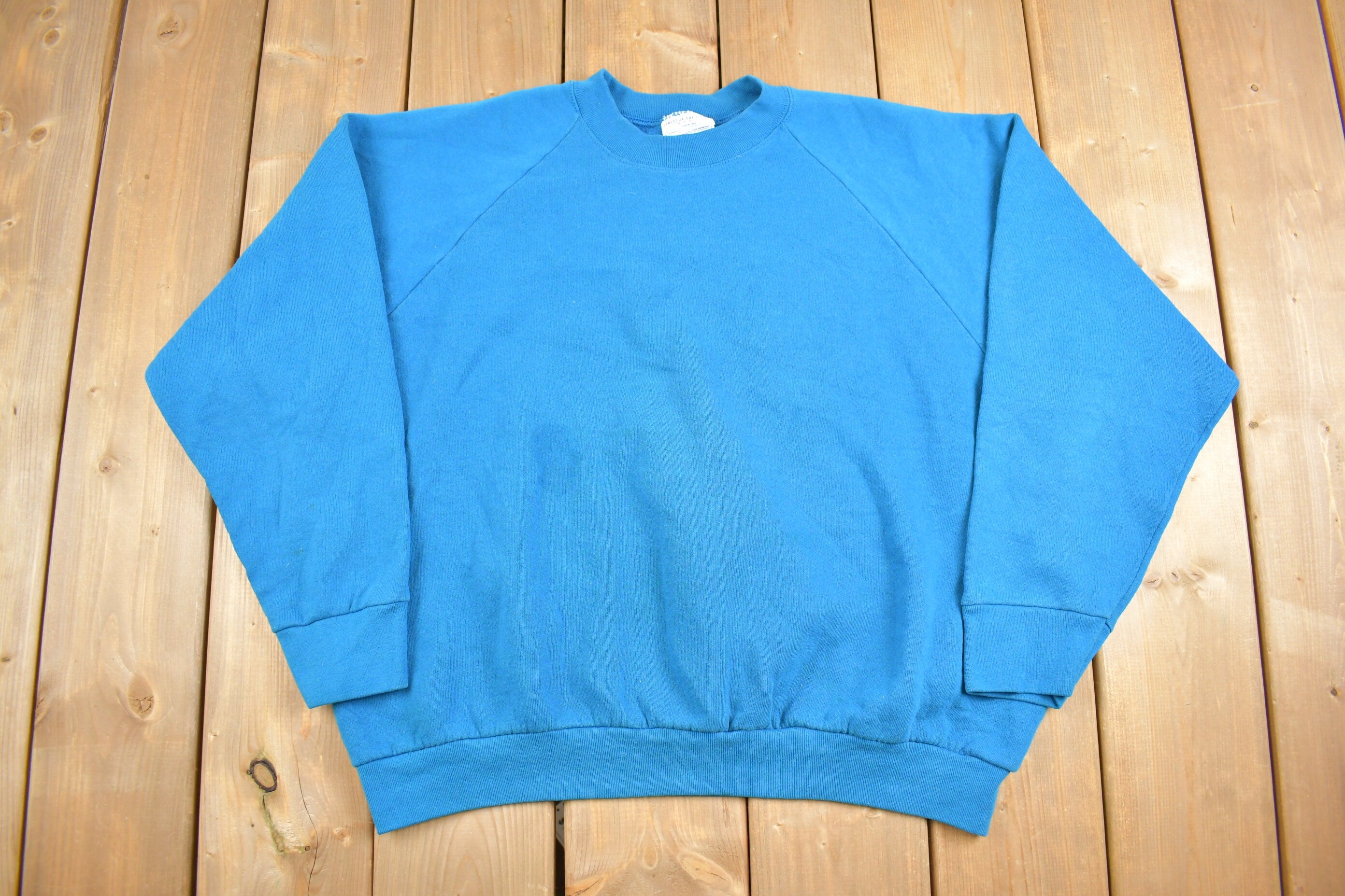 Vintage 1990s Fruit Of The Loom Blank Blue Raglan Crewneck Sweatshirt