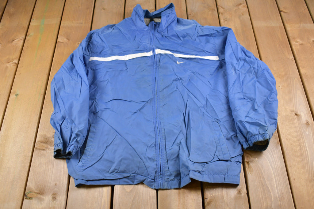Vintage 1990s Nike Mini Swoosh Windbreaker Jacket