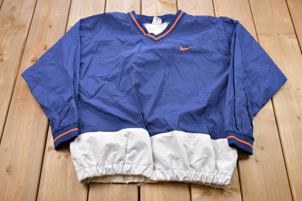 Vintage 1990s Kids Nike Embroidered Mini Swoosh Pullover Windbreaker
