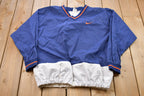 Vintage 1990s Kids Nike Embroidered Mini Swoosh Pullover Windbreaker