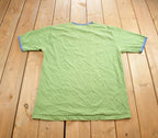 Vintage 1990s Hollywood Jean People Embroidered Graphic T-Shirt Made In USA