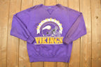 Vintage 1990s Minnesota Vikings NFL Champion Blue Tag Sweatshirt