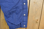 Vintage 1990s Nike Quarter Tearaway Mini Swoosh Splash Athletic Pants Size XL