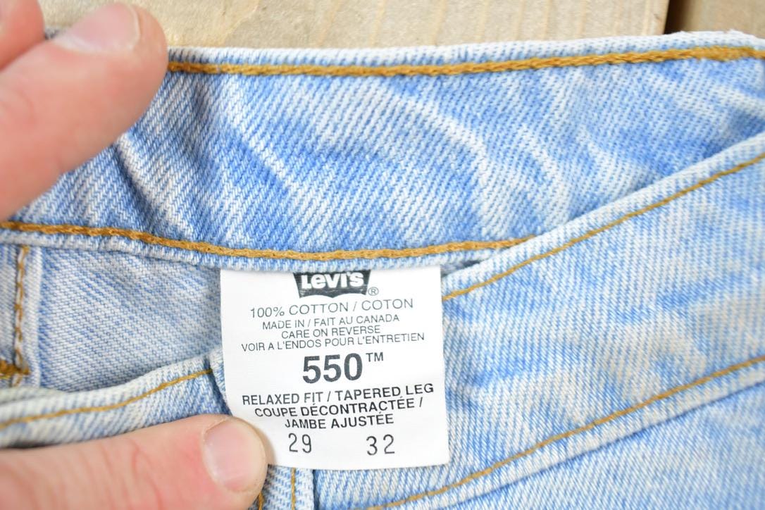 Vintage 1990s Levi Strauss Red Tab 550 Denim Jeans Size 29 x 32 Made In Canada