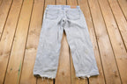 Vintage 1990s Levi's 550 Red Tab Distressed Jeans Size 32 x 27