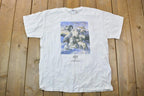 Vintage 1990s Humane Society Winter Animal Theme Graphic T-Shirt